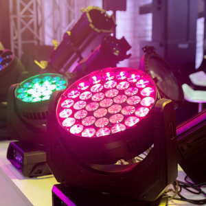 Stage lights displaying colorful LED patterns.